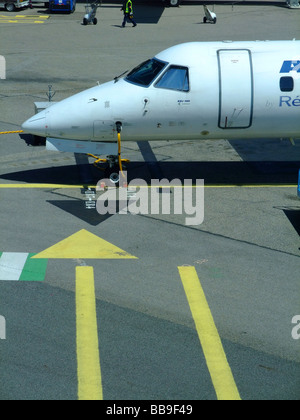 Embraer ERJ-145 regional jet of the company Regional (flying for Air France) on the parking at Lyon Saint Exupery airport Stock Photo