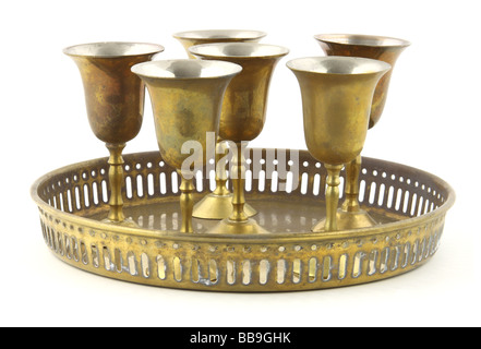 Round tray and metal goblets Stock Photo