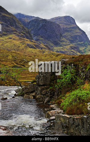 The Three Sisters of Glen Coe and river Coe in the Scottish Highlands Stock Photo