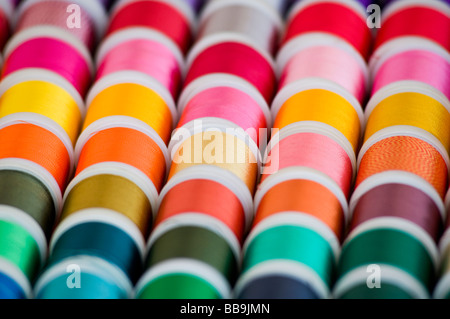 Colourful cotton reels on a market stall Stock Photo