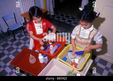 French girls, girls, French children, children, playing, at play, preschool, daycare center, Verneuil-sur-Seine, France Stock Photo