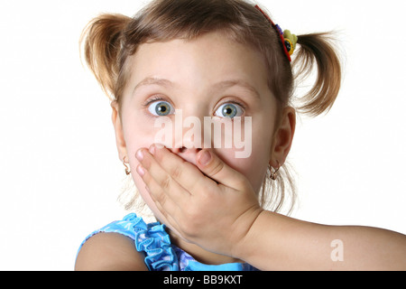 Little afraid girl gray background Stock Photo