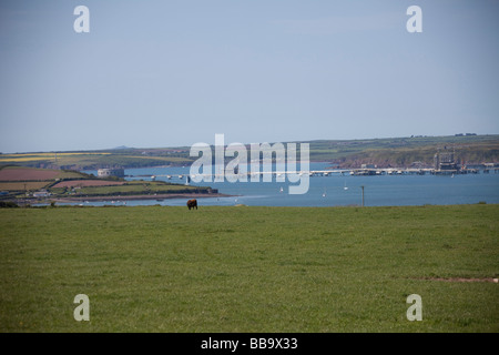 Texaco Refinery, jetty and cleddau estuary Pembroke pembrokeshire Wales UK Horizontal View. Stock Photo