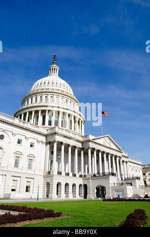 WASHINGTON, DC, United States — The United States Capitol Building stands prominently on Capitol Hill, its iconic dome rising between the Senate and House of Representatives wings. This neoclassical masterpiece, home to the U.S. Congress, dominates the Washington, DC skyline and serves as a symbol of American democracy and governance. The building's distinctive silhouette is recognizable from miles around, embodying the legislative heart of the nation. Stock Photo