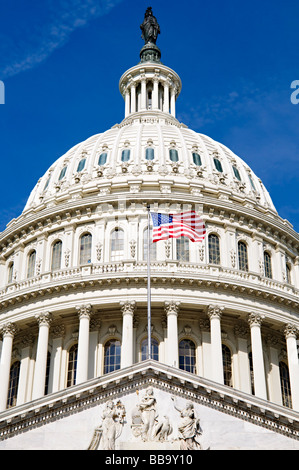 WASHINGTON, DC, United States — The United States Capitol Building stands prominently on Capitol Hill, its iconic dome rising between the Senate and House of Representatives wings. This neoclassical masterpiece, home to the U.S. Congress, dominates the Washington, DC skyline and serves as a symbol of American democracy and governance. The building's distinctive silhouette is recognizable from miles around, embodying the legislative heart of the nation. Stock Photo