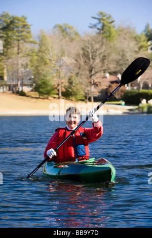 Woman in Kayak - Deer Lake, Brevard, North Carolina Stock Photo