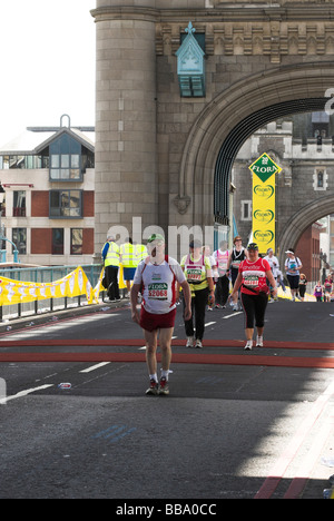 Runners in the 2009 London Marathon passing over Tower Bridge.
