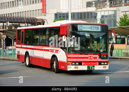 Typical local bus, seen departing a bus station in Osaka, Japan. Stock Photo