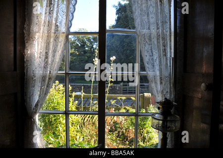 Looking through the window, traditional interior of english house, UK Stock Photo