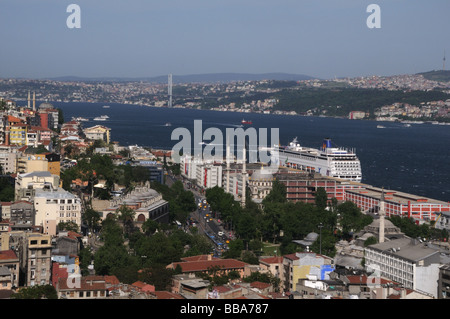 A cruise ship is docked in the Bosphorus, which separates the European side of Istanbul from the Asian side. Stock Photo