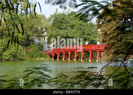 Buddhism, red wooden bridge with entrance tower to the Ngoc Son Temple, Hoan Kiem Lake, Hanoi, Vietnam, Southeast Asia, Asia Stock Photo