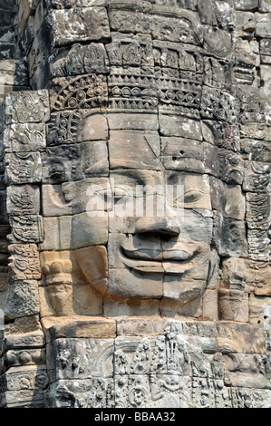 Huge face of the Bodhisattva Lokeshvara chiselled in stone, also called Avalokiteshvara, Bayon Temple, Angkor Thom, UNESCO Worl Stock Photo