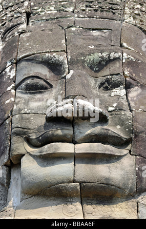 Huge face of the Bodhisattva Lokeshvara chiselled in stone, also called Avalokiteshvara, Bayon Temple, Angkor Thom, UNESCO Worl Stock Photo