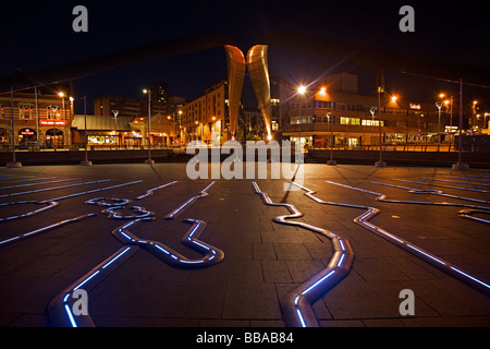 Millenium Place Coventry at night showing the Whittle Arch and Sir Frank Whittle memorial sculpture, West Midlands of England Stock Photo