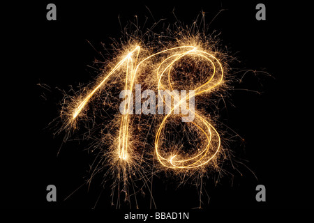 The number 18 written with a sparkler Stock Photo