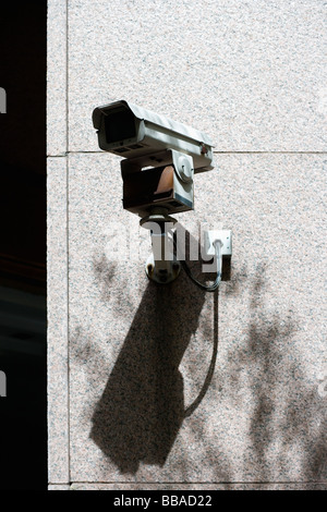 Surveillance camera on the exterior of a building Stock Photo