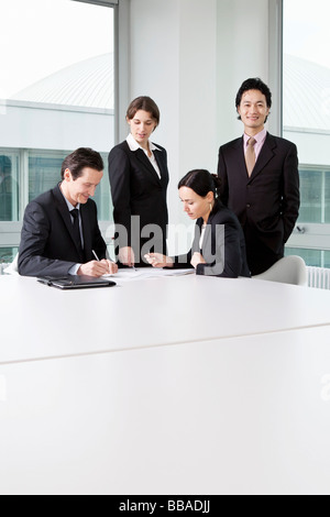 Four business people in a business meeting Stock Photo