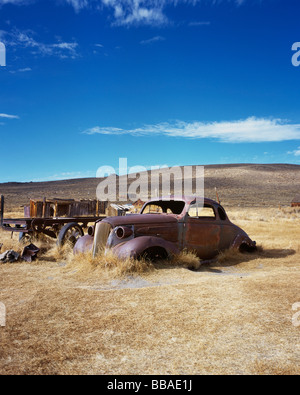 An old abandoned car in a field, Bodie State Historic Park, California, USA Stock Photo