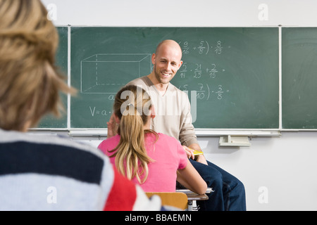 A teacher teaching a class Stock Photo