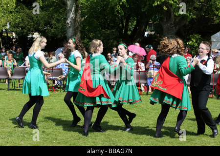 Young irish teenage girls dancing a traditional jig at a summer fete ...