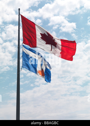 Flags of Canada and Toronto flying in the wind Stock Photo