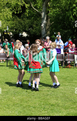 Young irish teenage girls dancing a traditional jig at a summer fete ...