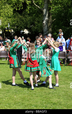 Young irish teenage girls dancing a traditional jig at a summer fete ...