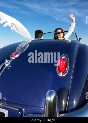 Couple in an old convertible Stock Photo