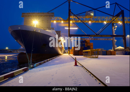 Ship docked in container harbour Stock Photo