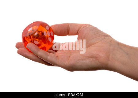 red dice in hand isolated on white background Stock Photo