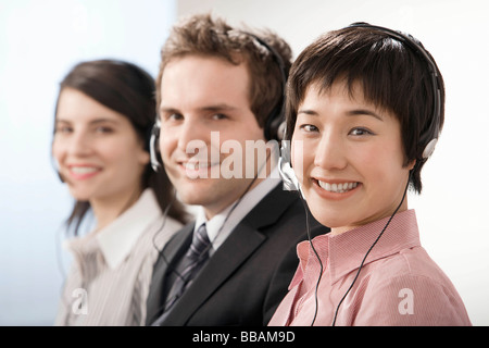 A line of telephone operators Stock Photo