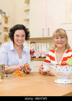 Two women cooking. Stock Photo