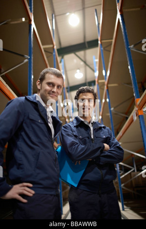 Two workers in warehouse Stock Photo