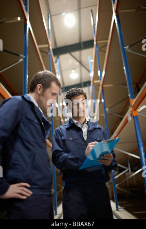 Two workers in warehouse Stock Photo