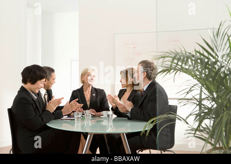 Applause in a business meeting Stock Photo