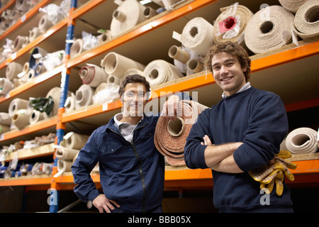 Two workers in warehouse Stock Photo