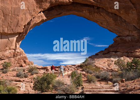 Visitors at North Window Arch Arches National Park Utah USA Stock Photo