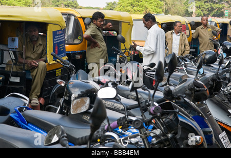 Autorickshaws and motorbikes MG Road area Bangalore Karnataka India Stock Photo