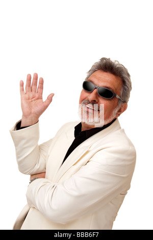 man wearing a pair of sunglasses and waving his hand Stock Photo