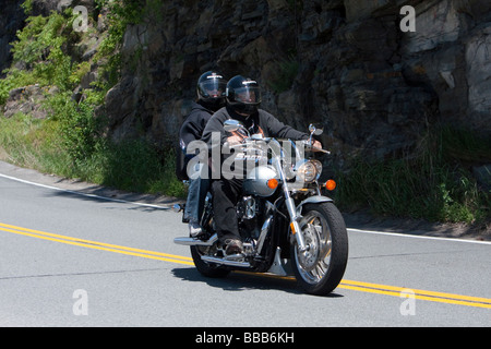 Two up riding on a touring motorbike motorcycle Stock Photo - Alamy