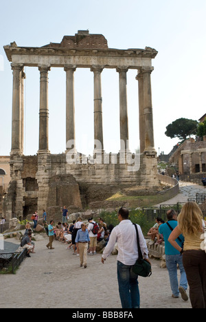 Tourists around the Temple of Saturn in The Roman Forum Stock Photo