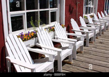 Adirondack chairs outside the Scrimshaw Restaurant, Greenport, Long Island, NY USA Stock Photo