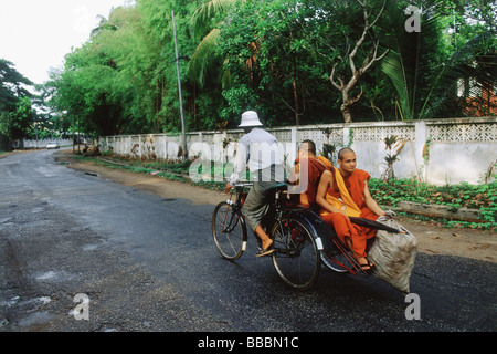 Myanmar (Burma), Yangon (Rangoon), Monks relying on bicycles for transportation. Stock Photo