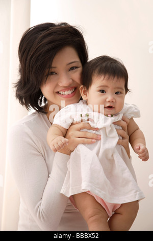 Young woman with baby girl Stock Photo