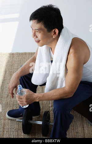 Man drinking water after workout Stock Photo
