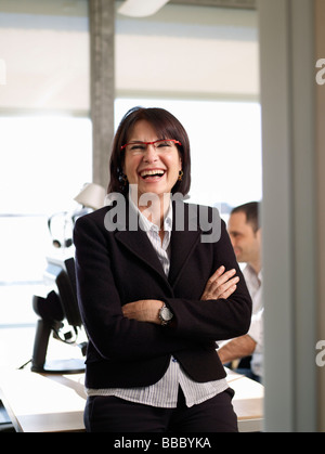 Portrait of business woman laughing Stock Photo