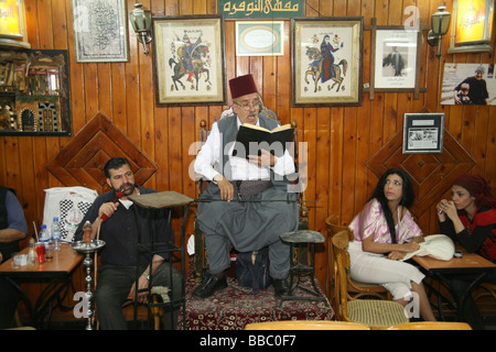 Traditional story teller or 'hakawati' at the Al- Nawfars coffee house Damascus Stock Photo