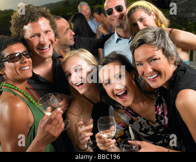 Friends toasting their glasses Stock Photo