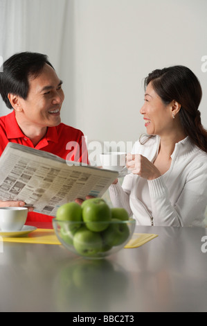 Mature couple at home having coffee Stock Photo