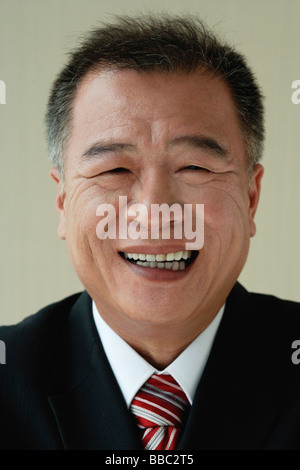 A man smiles at the camera Stock Photo